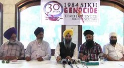 AISSF President and others addressing the media