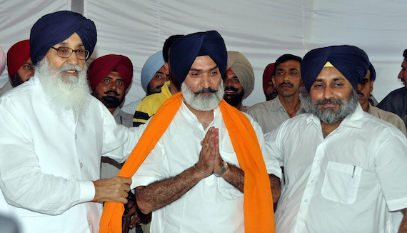 Parkash Singh Badal (L), Deepinder Dhillon (C) and Sukhbir Badal (R) [File Photo]