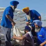 Volunteers distributing relief material to the flood victims in Gurdaspur