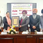 Prof. (Dr.) Prit Pal Singh, Prof. (Dr.) Sukhwinder Singh Billing, Prof. (Dr.) Tejbir Singh, Prof. Satnam Singh Deol, Dr. Sikandar Singh, and Dr. Harpreet Kaur felicitating Dr. Navreet Kaur.