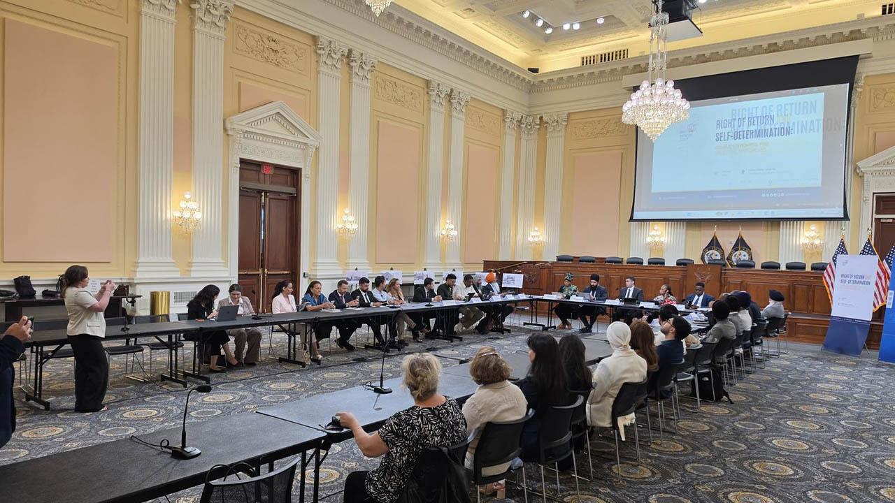 Wide view of the international conference at the US Capitol.