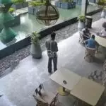 Screengrab from CCTV footage posted by Bikram Majithia allegedly showing Punjab police officials and person who helped them secure forensic report related to Bhagwant Mann viral video