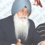 HS Dhami talking to the media