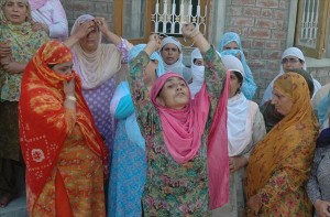 Women mourn over the death of Youth in custody