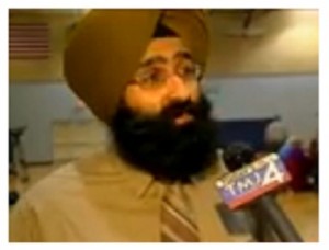 A Sikh representative talking to media on Oak Creek panel on violance control