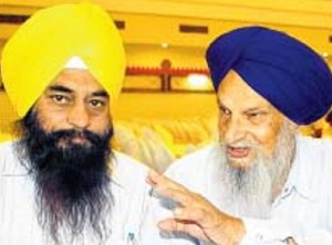 Talib Singh Sandhu (R) addressing media-persons