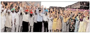 illage Panchayat, Village Resident and family members of Sukhjinder Singh showing their protest against framing of Sukhjinder Singh in false case [September 16, 2013]
