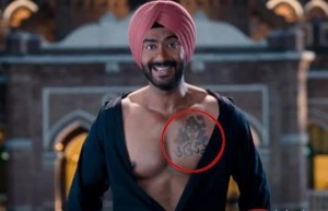 Ajay Devgan in and as "Son of Sardar" (Hindu god Shiva's tattoo on his chest has also attracted controversy) Ajay Devgan in and as "Son of Sardar" (Hindu god Shiva's tattoo on his chest has also attracted controversy)
